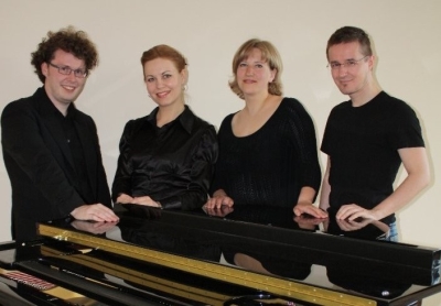 Justas Morkūnas (pirmas iš kairės), Giedrė Jurčiukonytė, Asta Gasparavičiūtė, Vytautas Meškauskas – VU choro „Pro musica“ atlikėjai. R. Vaitekuno nuotr.